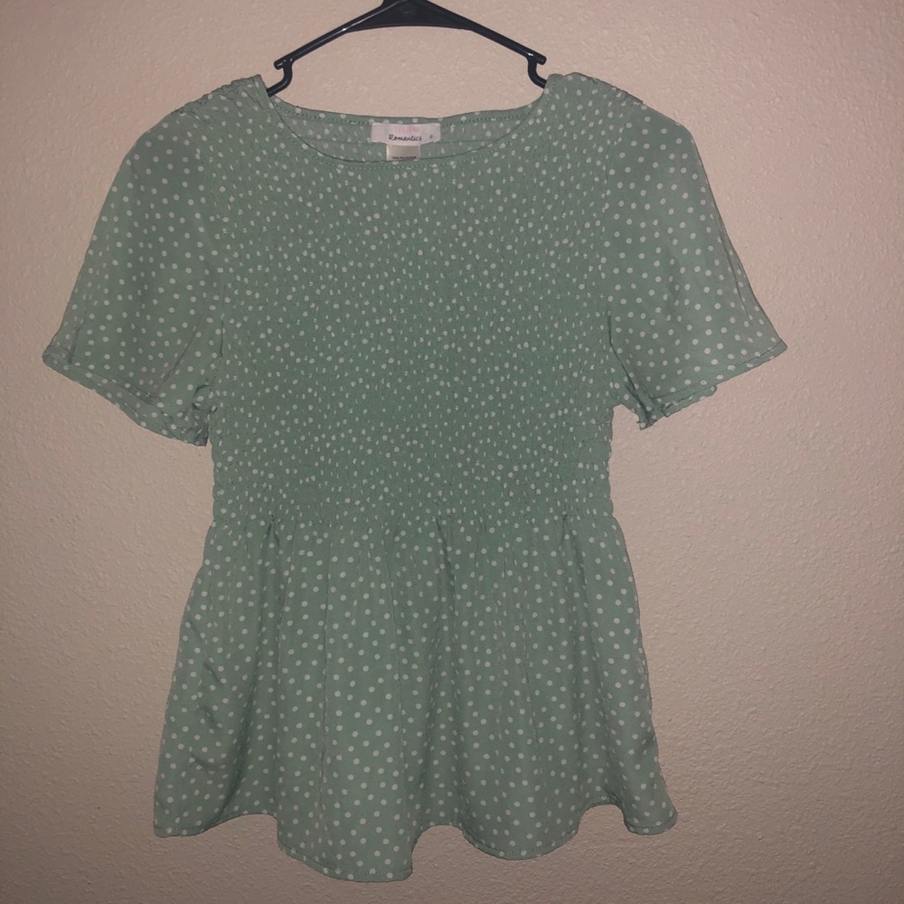 green top with white dots